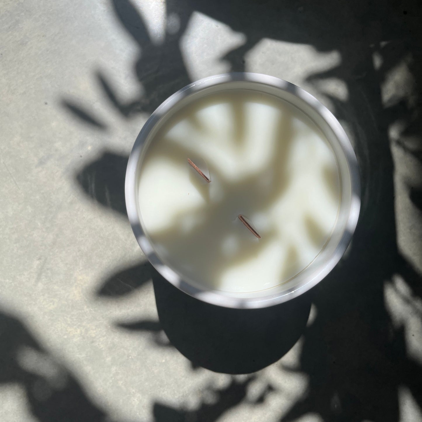 Scented candle in ceramic vessel