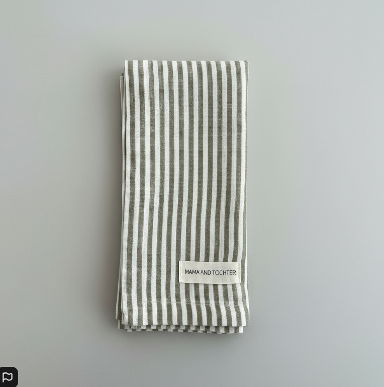 Striped tea towel with a label