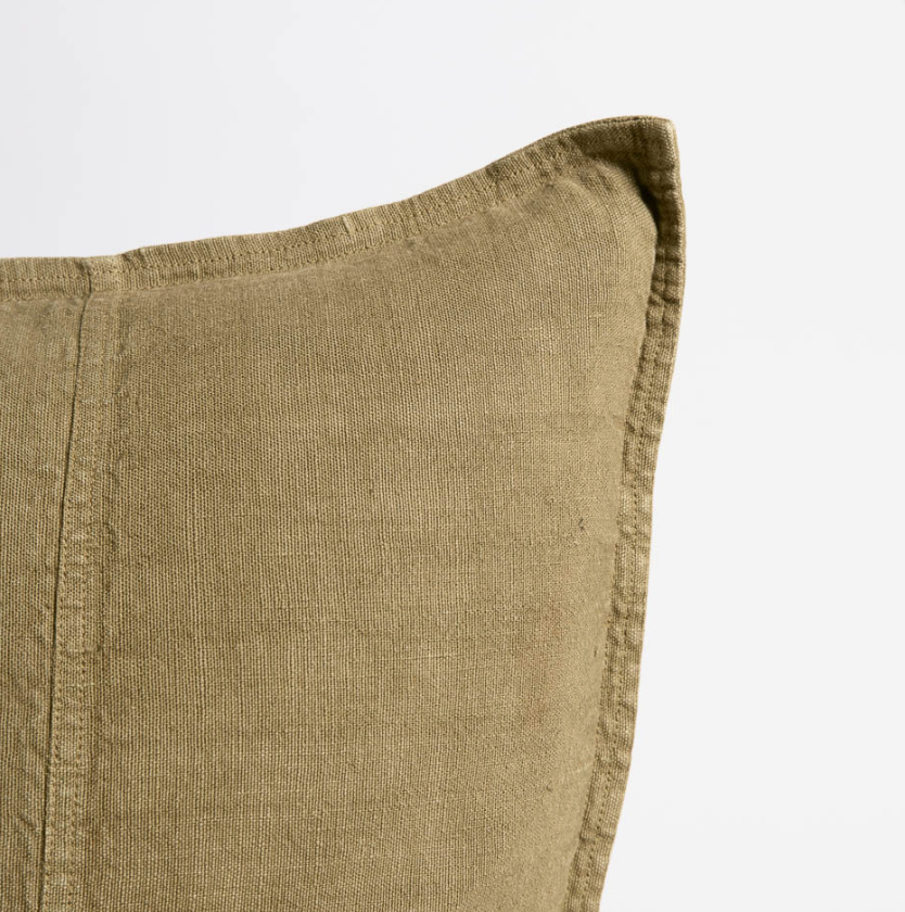 Close-up of olive linen cushion