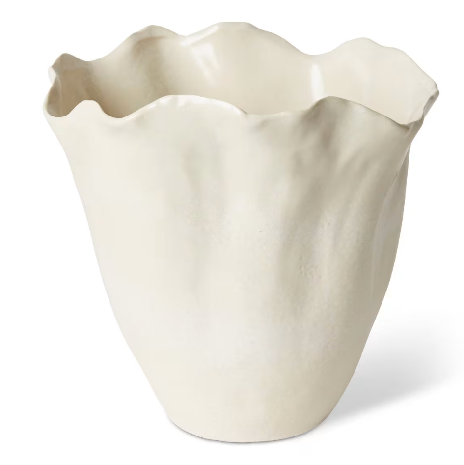 An off-white ceramic vase with a wavy, scalloped rim and a textured, organic shape, shown on a white background with a soft shadow.