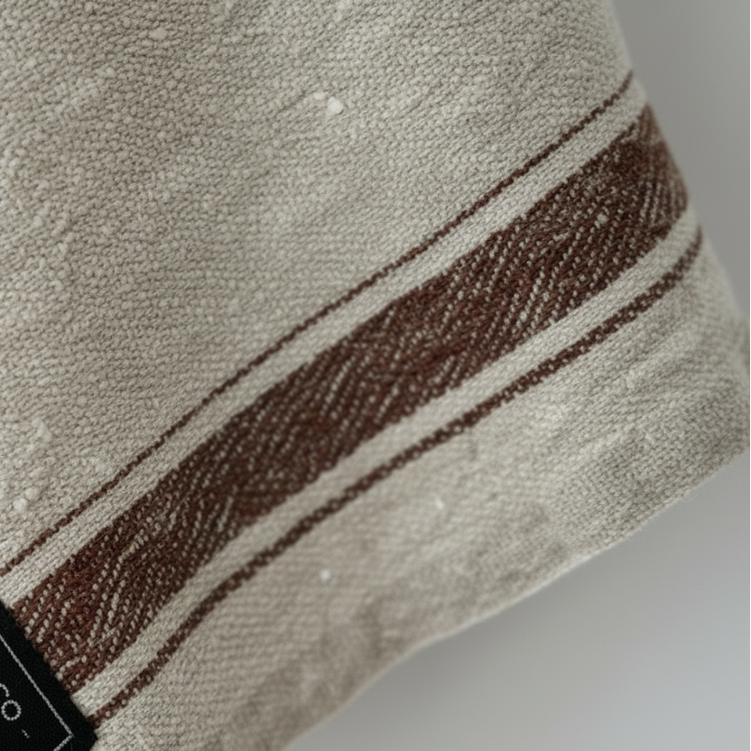 Beige tea towel with brown stripe