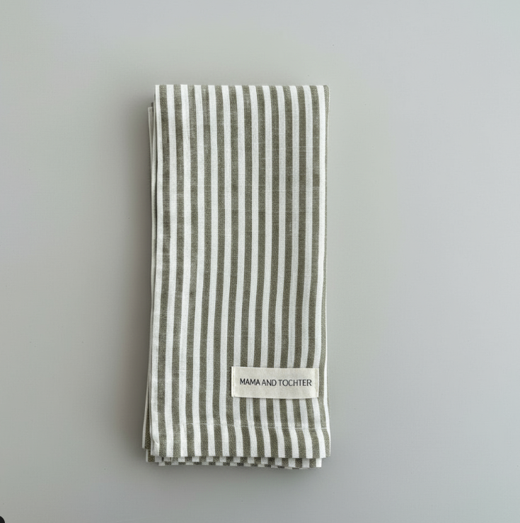 Striped tea towel with a label 