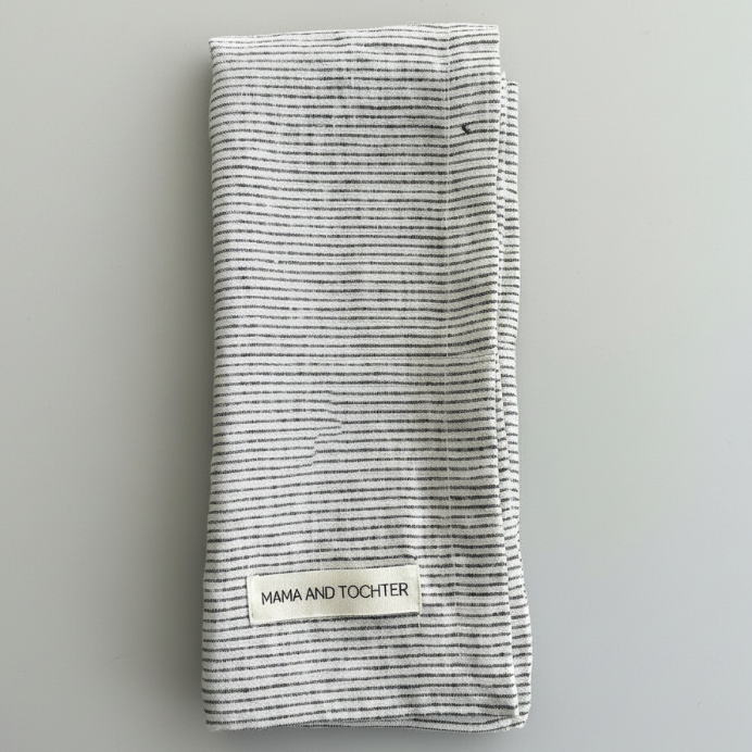 Striped tea towel with 'MAMA AND TOCHTER' label 