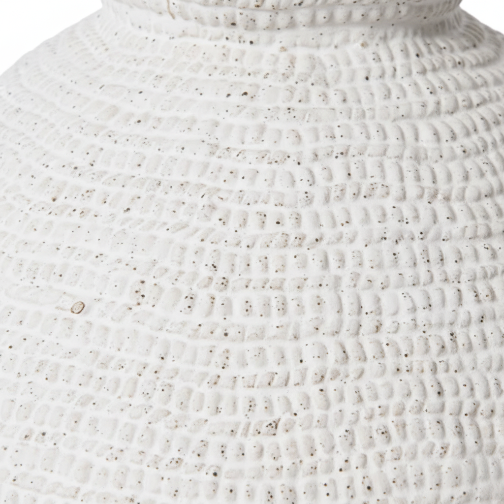 A large, textured white ceramic vase with a wide, rounded body and a short flared neck, shown on a clean white background.
